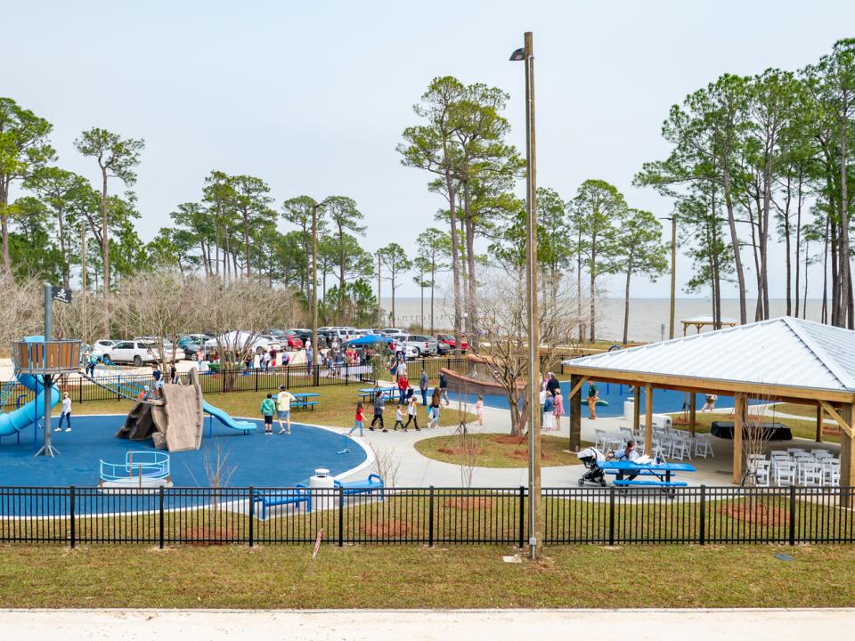 Bayfront Park's nautical-themed playground (Photo: Mobile County) a kid's playground with people milling about